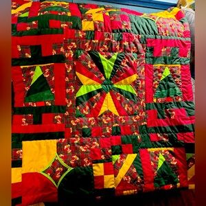 Ho-Ho-Ho with this beautifully made Christmas’s tree block quilt.